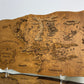 The Middle-earth map, in Rosewood color, measures 50x28 cm