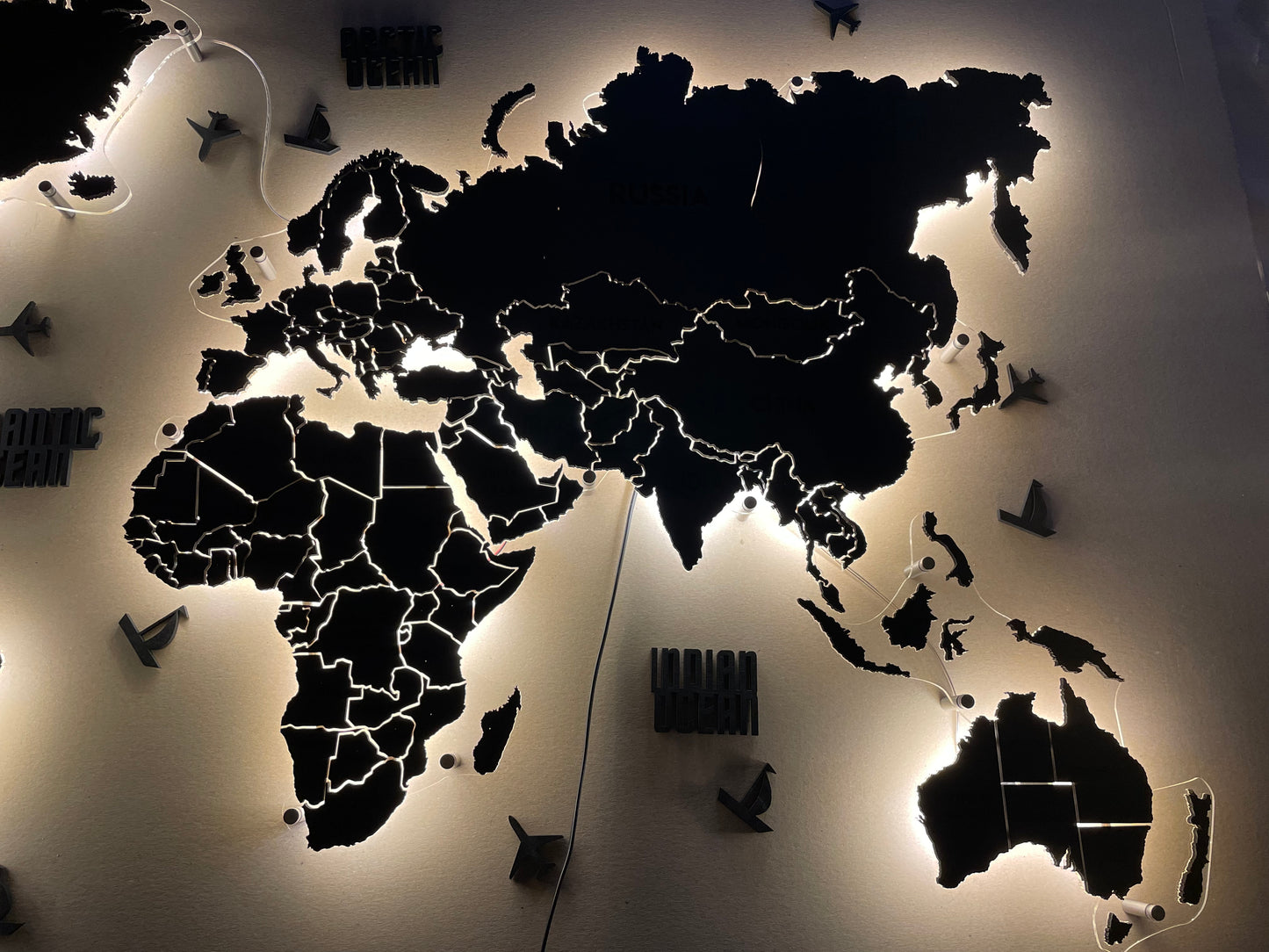 LED world map on acrylic glass with LED lighting between countries color Nero