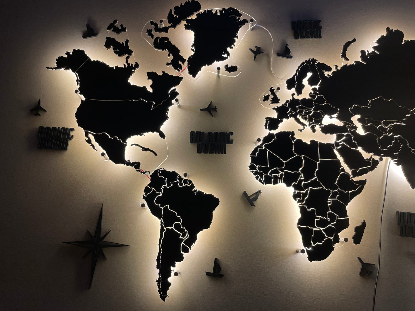 LED world map on acrylic glass with LED lighting between countries color Nero