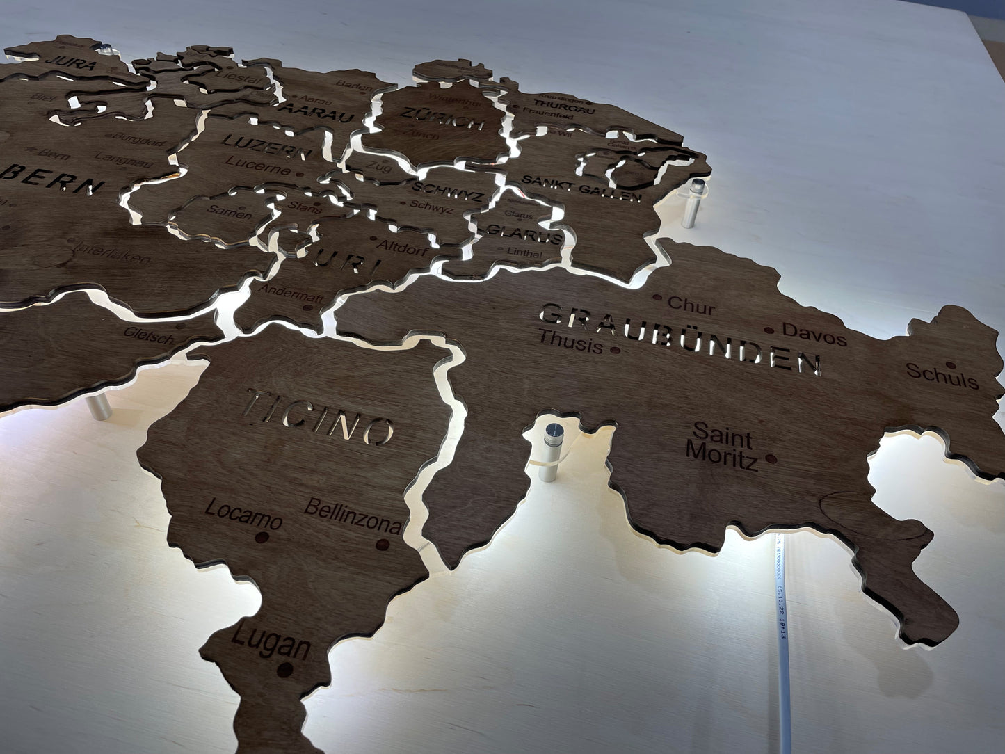 Switzerland  LED map on acrylic glass with backlighting between regions color Rosewood