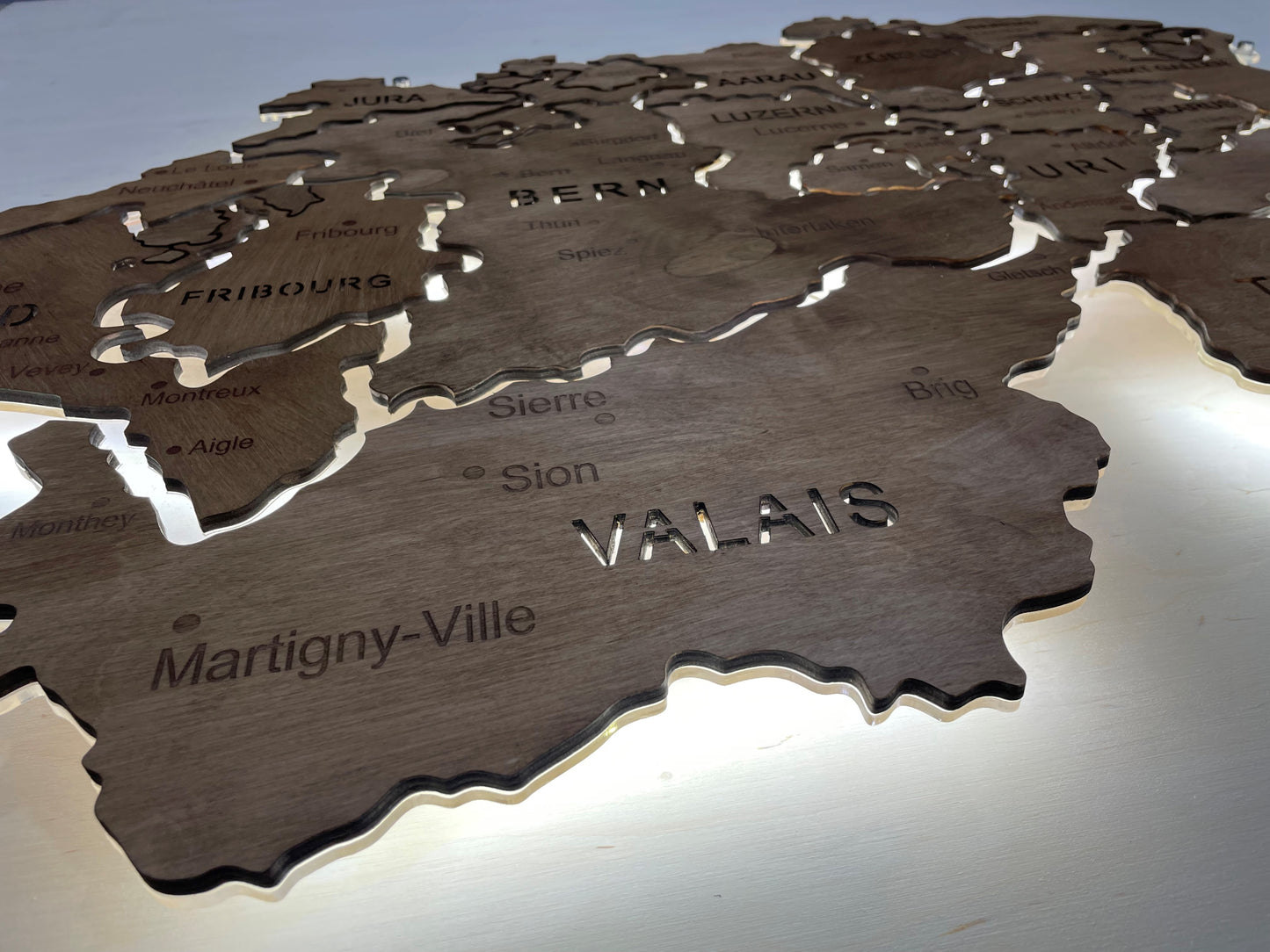 Switzerland  LED map on acrylic glass with backlighting between regions color Rosewood