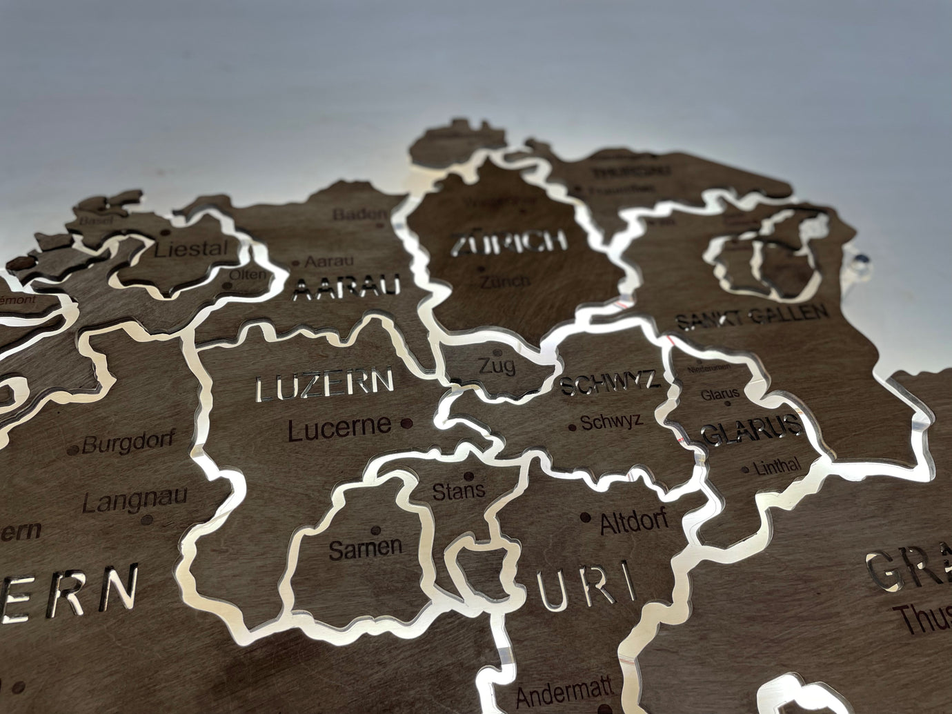 Switzerland  LED map on acrylic glass with backlighting between regions color Rosewood