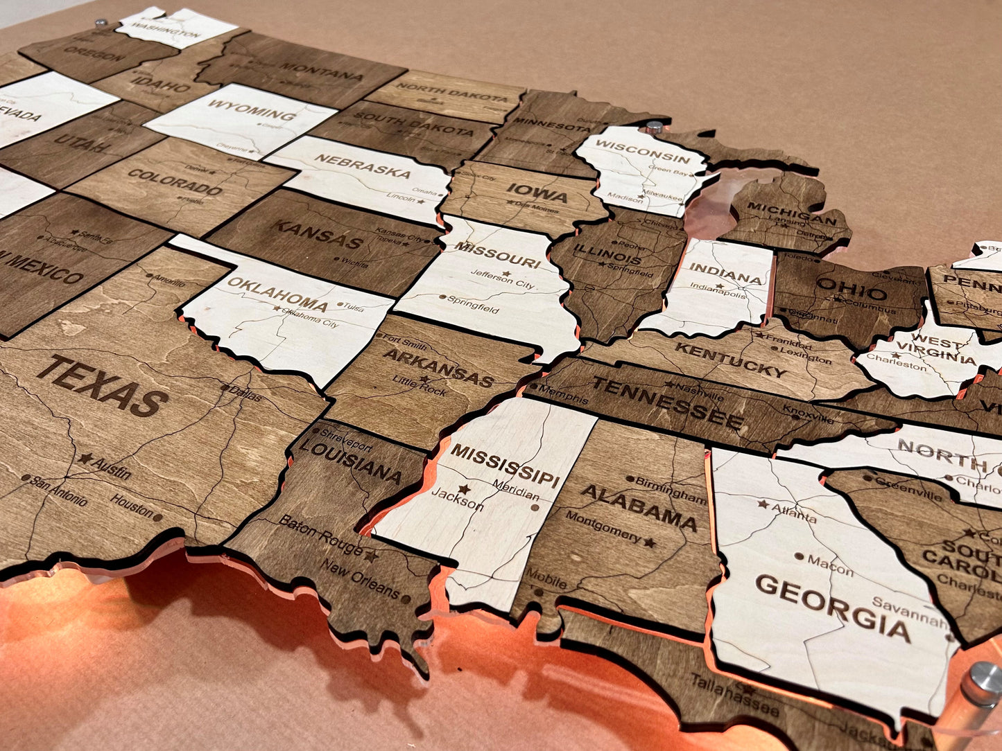 The USA LED map on acrylic glass with roads and backlighting between states color Terra