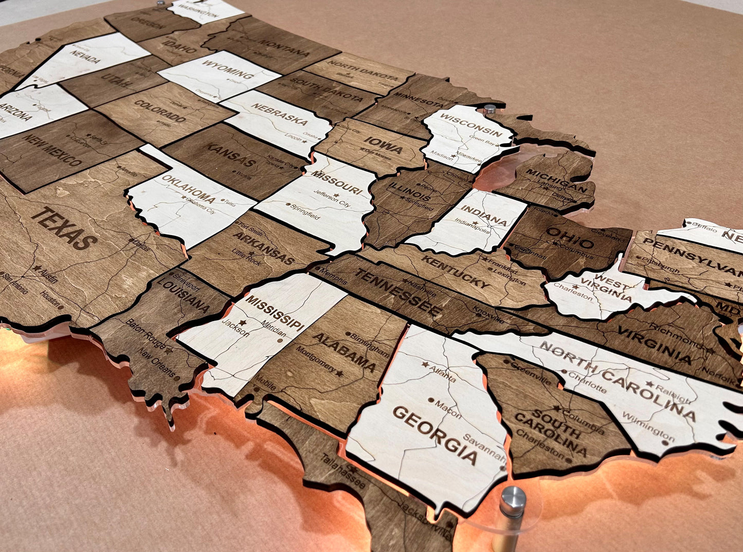 The USA LED map on acrylic glass with roads and backlighting between states color Terra