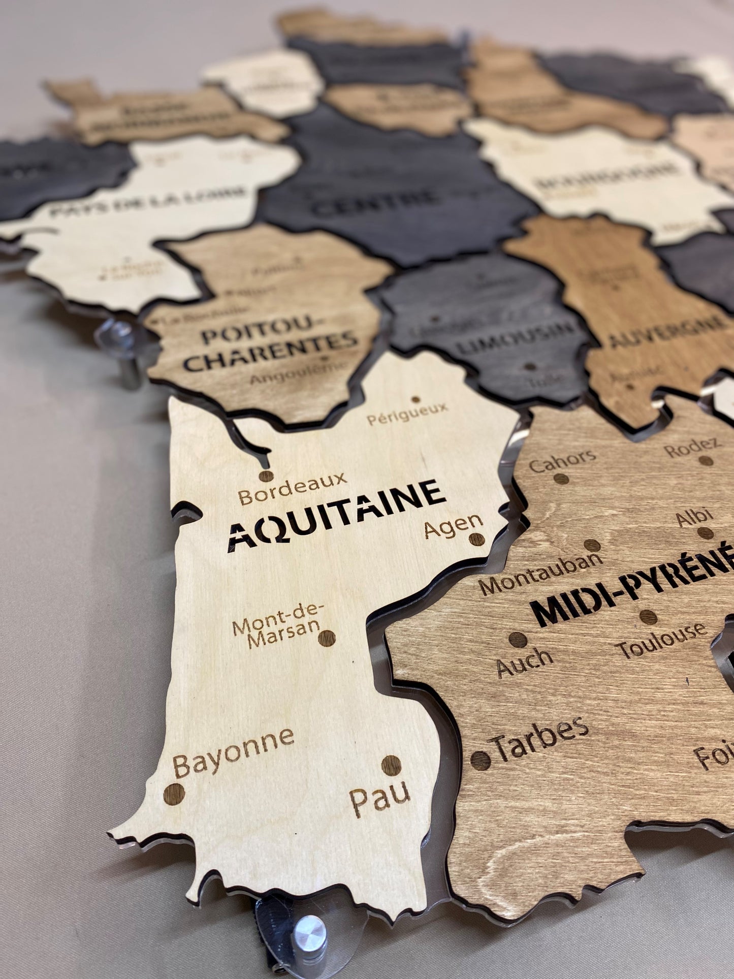 France LED map on acrylic glass with backlighting between regions color Bordo